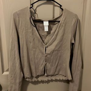 brown button up shirt